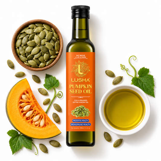 A bottle of Lusha Pumpkin Seed Oil centered on a white background, surrounded by pumpkin seeds, a sliced pumpkin, green leaves, and a small white cup of golden oil. The bottle has an orange label and is photographed in a clean, styled flat-lay composition.